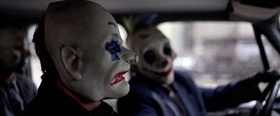Still from The Dark Knight (2008) that has been tagged with: mask & day & profile shot