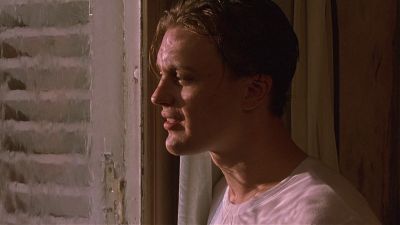 Still from The Dreamers (2003) that has been tagged with: interior & medium close-up & profile shot