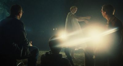 Still from The Fabelmans (2022) that has been tagged with: headlight & group-shot & dancer & over-the-shoulder