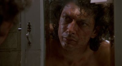 Still from The Fly (1986) that has been tagged with: mirror