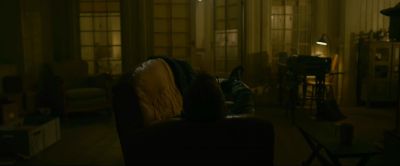Still from The Girl with the Dragon Tattoo (2011) that has been tagged with: wide shot & couch & night