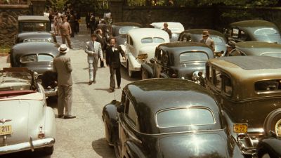 Still from The Godfather (1972) that has been tagged with: group-shot & day & wide shot