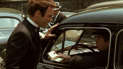 Still from The Godfather (1972) that has been tagged with: cd9574 & over-the-shoulder & exterior & medium shot & day