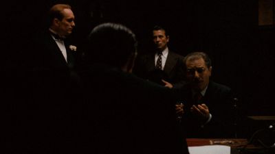Still from The Godfather (1972) that has been tagged with: 470607 & wide shot & group-shot & interior