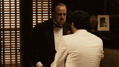Still from The Godfather (1972) that has been tagged with: a67a59 & two-shot & blinds & medium wide