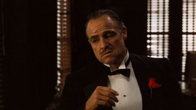 Still from The Godfather (1972) that has been tagged with: medium shot & blinds