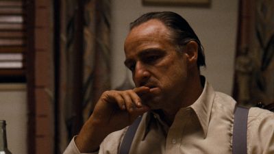 Still from The Godfather (1972) that has been tagged with: clean single & living room & medium close-up