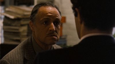 Still from The Godfather (1972) that has been tagged with: office & interior & over-the-shoulder & day & medium close-up