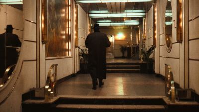 Still from The Godfather (1972) that has been tagged with: 714f38 & hallway & hotel lobby & over-the-shoulder