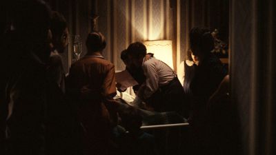 Still from The Godfather (1972) that has been tagged with: practical lamp & interior & bed & night & group-shot