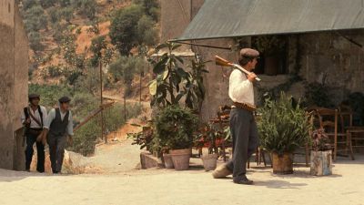 Still from The Godfather (1972) that has been tagged with: countryside & wide shot & three-shot
