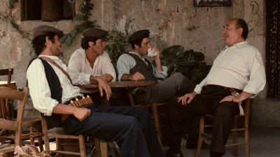 Still from The Godfather (1972) that has been tagged with: table & group-shot