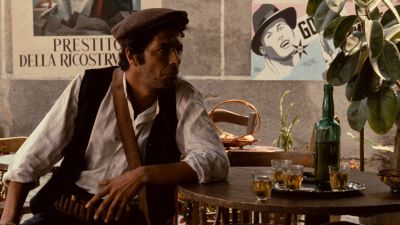 Still from The Godfather (1972) that has been tagged with: exterior & drinking