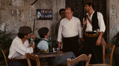 Still from The Godfather (1972) that has been tagged with: gun & drinking