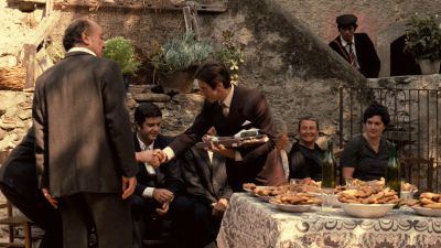 Still from The Godfather (1972) that has been tagged with: table & handshake