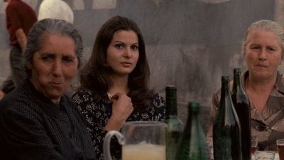 Still from The Godfather (1972) that has been tagged with: exterior & table & drinking & medium shot