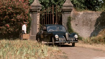Still from The Godfather (1972) that has been tagged with: day & car & gate