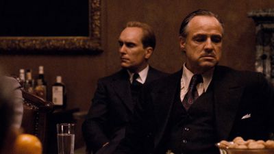Still from The Godfather (1972) that has been tagged with: interior & two-shot & day & table