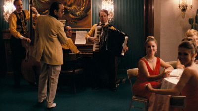 Still from The Godfather (1972) that has been tagged with: table & day & wide shot & bar