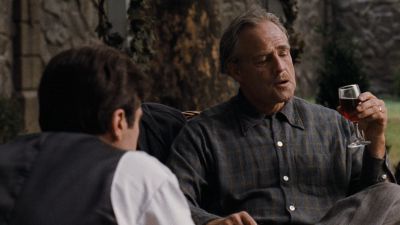 Still from The Godfather (1972) that has been tagged with: medium shot & wine & day