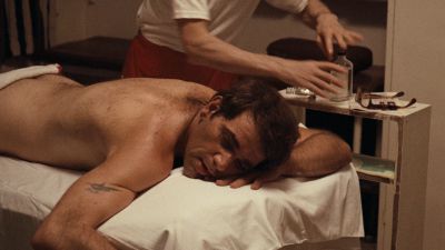 Still from The Godfather (1972) that has been tagged with: massage & interior & clean single & massage table & medium shot