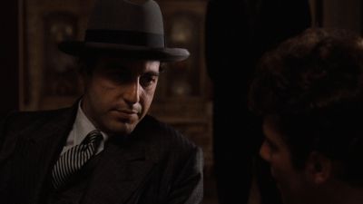 Still from The Godfather (1972) that has been tagged with: 000000 & medium close-up & exterior