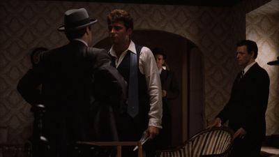 Still from The Godfather (1972) that has been tagged with: c3b192 & night & interior & medium wide