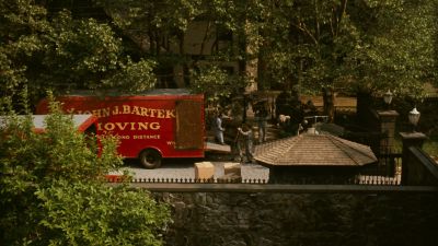 Still from The Godfather (1972) that has been tagged with: day & establishing shot & moving truck