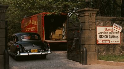 Still from The Godfather (1972) that has been tagged with: day & moving truck