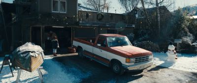 Still from Commercial: Coca Cola — "The Letter" that has been tagged with: day & snow & driveway & truck