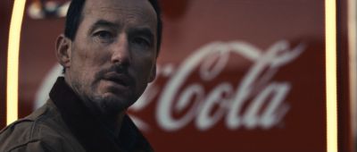 Still from Commercial: Coca Cola — "The Letter" that has been tagged with: night & medium close-up