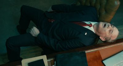 Still from The Limits of Control (2009) that has been tagged with: office & medium wide & high-angle & interior & dead body