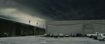 Still from The Machinist (2004) that has been tagged with: parking lot