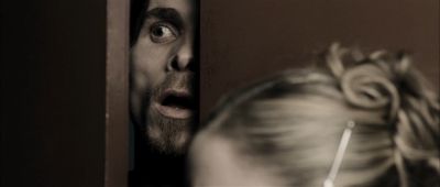 Still from The Machinist (2004) that has been tagged with: peeking
