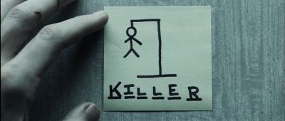 Still from The Machinist (2004) that has been tagged with: handwriting