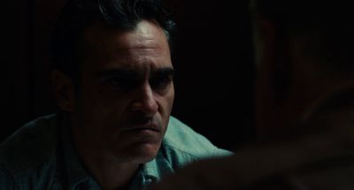 Still from The Master (2012) that has been tagged with: over-the-shoulder & close-up & night