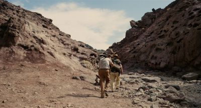 Still from The Master (2012) that has been tagged with: wide shot & mountains & desert