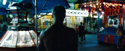 Still from The Place Beyond The Pines (2012) that has been tagged with: 0065a3 & amusement park