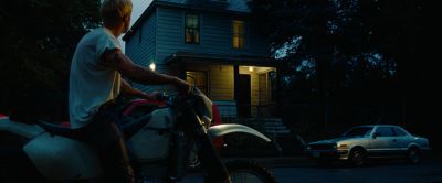 Still from The Place Beyond The Pines (2012) that has been tagged with: suburban street & motorcycle