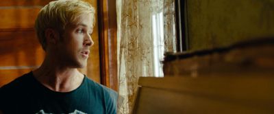 Still from The Place Beyond The Pines (2012) that has been tagged with: 7a3f00 & window