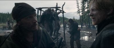 Still from The Revenant (2015) that has been tagged with: group-shot & working & exterior & day