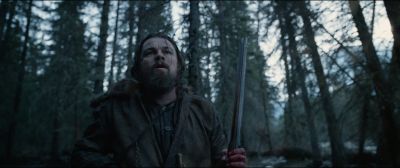 Still from The Revenant (2015) that has been tagged with: clean single & gun & woods & forest