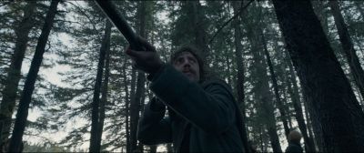 Still from The Revenant (2015) that has been tagged with: medium shot & woods & clean single