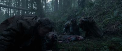 Still from The Revenant (2015) that has been tagged with: bear & exterior & wide shot & group-shot & woods