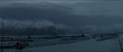 Still from The Revenant (2015) that has been tagged with: extreme wide & group-shot & river