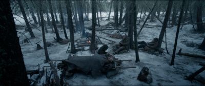Still from The Revenant (2015) that has been tagged with: 92a3b0 & day & campfire & woods & camp