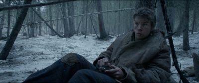 Still from The Revenant (2015) that has been tagged with: sitting & day