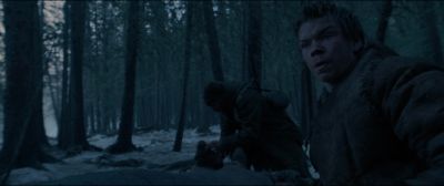 Still from The Revenant (2015) that has been tagged with: two-shot & forest & day & medium shot