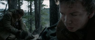 Still from The Revenant (2015) that has been tagged with: exterior & woods & forest & two-shot