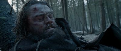 Still from The Revenant (2015) that has been tagged with: day & snow & clean single & forest